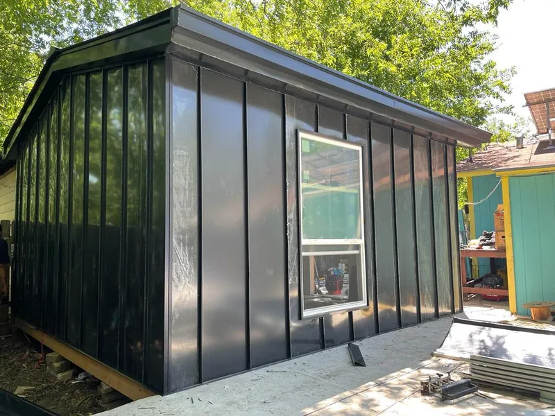 Black standing seam metal wall panels for Metal Roof Installation in Warrington