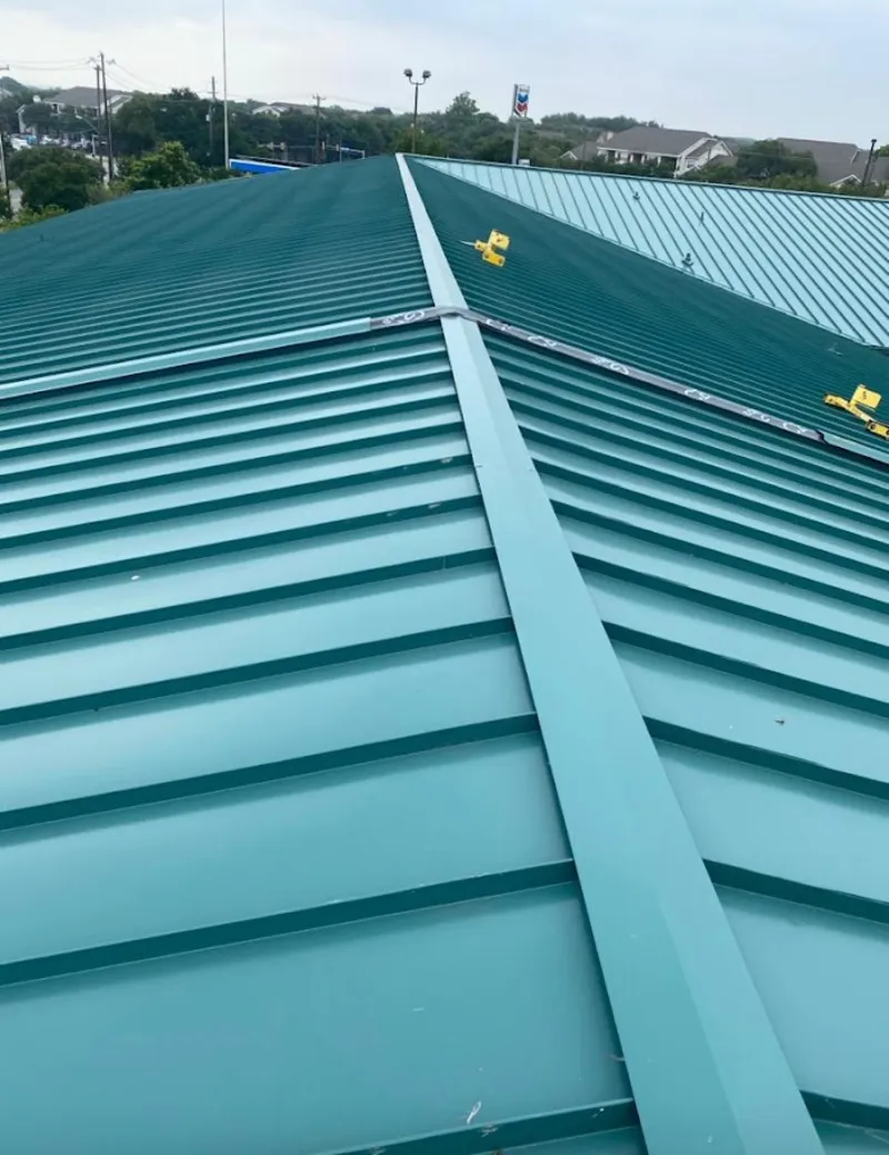 Green commercial metal roof ridge and valley for Metal Roof Repair in Warrington
